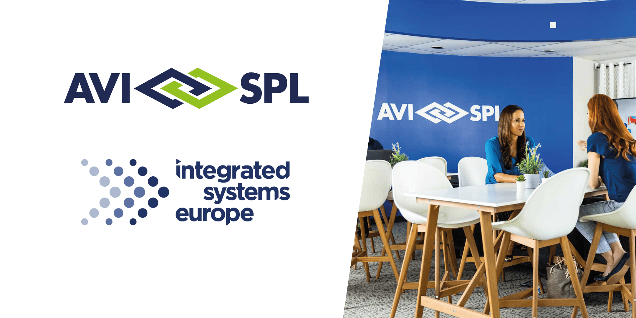 Two women at a table in a modern office; AVI-SPL and Integrated Systems Europe logos on a blue wall.